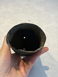 Seven various Chinese bronze and cast-iron bells, Han and later