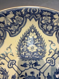 A large Chinese blue and white dish with floral design, Kangxi