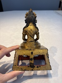 A Sino-Tibetan gilt-lacquered figure of Buddha Amitayus, Qianlong