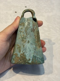 Seven various Chinese bronze and cast-iron bells, Han and later