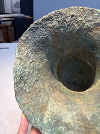 A Chinese archaic bronze ritual wine vessel with Taotie design, 'Zun 尊', Shang