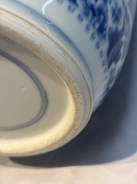 A Chinese blue and white rouleau vase with floral design, Kangxi
