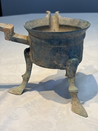 A Chinese archaic bronze food warming vessel, 'Jiao Dou 鐎斗', Han