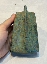 Seven various Chinese bronze and cast-iron bells, Han and later