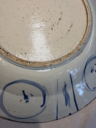 A very large Chinese blue and white 'Kraak' dish with geese by the water, Wanli