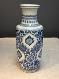 A Chinese blue and white rouleau vase with floral design, Kangxi
