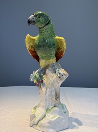 A German polychrome 'Parrot on Tree Stump' sculpture, SP Dresden mark, 20th C.