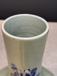 A Chinese blue and white celadon-ground 'Sanxing' bottle vase with relief design, 19th C.