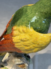 A German polychrome 'Parrot on Tree Stump' sculpture, SP Dresden mark, 20th C.