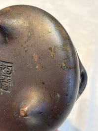 A Chinese bronze handled tripod censer, Yu Tang Jing Wan 玉堂精玩 mark, 17th C.