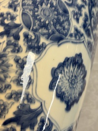 A Chinese blue and white rouleau vase with floral design, Kangxi