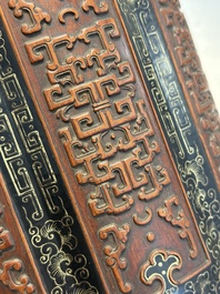 A Chinese gilt black-lacquered huanghuali brush pot with chilong design, Kangxi/Yongzheng