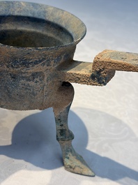 A Chinese archaic bronze food warming vessel, 'Jiao Dou 鐎斗', Han