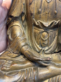 A Chinese gilt-lacquered wooden seated Bodhisattva, Ming