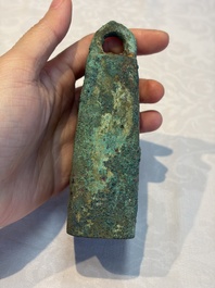 Seven various Chinese bronze and cast-iron bells, Han and later