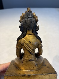 A Sino-Tibetan gilt-lacquered figure of Buddha Amitayus, Qianlong