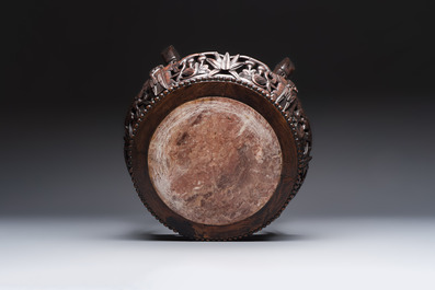 A Chinese marble-topped hongmu stand, 19/20th C.