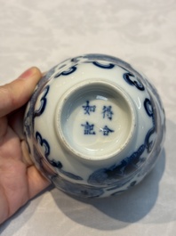 A Chinese blue and white 'Buddhist Lion' teapot, covered bowl and a saucer, various marks, 19th C.