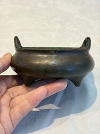 A Chinese bronze handled tripod censer, Yu Tang Jing Wan 玉堂精玩 mark, 17th C.