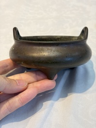 A Chinese bronze handled tripod censer, Yu Tang Jing Wan 玉堂精玩 mark, 17th C.