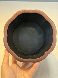 A Chinese gilt black-lacquered huanghuali brush pot with chilong design, Kangxi/Yongzheng
