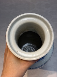 A Chinese blue and white rouleau vase with floral design, Kangxi