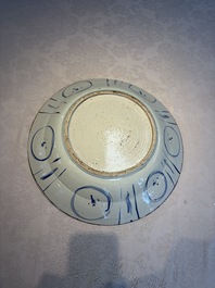 A very large Chinese blue and white 'Kraak' dish with geese by the water, Wanli