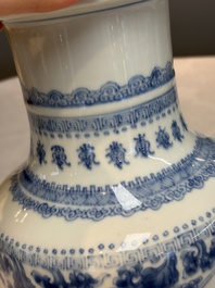 A Chinese blue and white rouleau vase with floral design, Kangxi