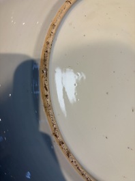 A large Chinese blue and white dish with floral design, Kangxi