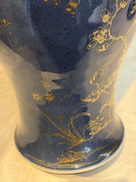 A Chinese gilt-decorated powder-blue-ground 'Phoenix among Blossoming Branches' vase, Qianlong