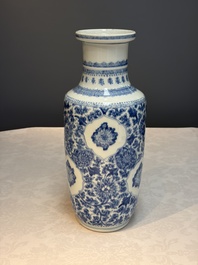 A Chinese blue and white rouleau vase with floral design, Kangxi