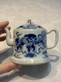A Chinese blue and white 'Buddhist Lion' teapot, covered bowl and a saucer, various marks, 19th C.