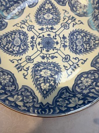 A large Chinese blue and white dish with floral design, Kangxi
