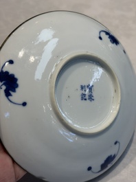 A Chinese blue and white 'Buddhist Lion' teapot, covered bowl and a saucer, various marks, 19th C.