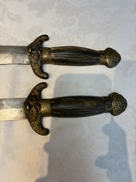 A rare set of Chinese double swords and scabbard, &lsquo;Shuangjian&rsquo;, Longquan mark, 19th C.