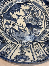 A very large Chinese blue and white 'Kraak' dish with geese by the water, Wanli