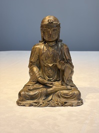 A Chinese gilt-lacquered wooden seated Bodhisattva, Ming