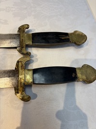 A rare set of Chinese double swords and scabbard, &lsquo;Shuangjian&rsquo;, Longquan mark, 19th C.