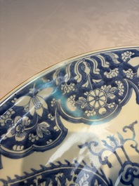 A large Chinese blue and white dish with floral design, Kangxi