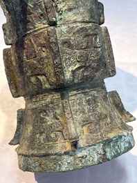 A Chinese archaic bronze ritual wine vessel with Taotie design, 'Zun 尊', Shang