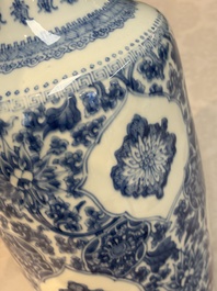 A Chinese blue and white rouleau vase with floral design, Kangxi