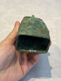 Seven various Chinese bronze and cast-iron bells, Han and later