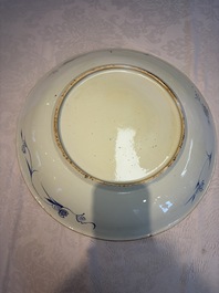 A large Chinese blue and white dish with floral design, Kangxi
