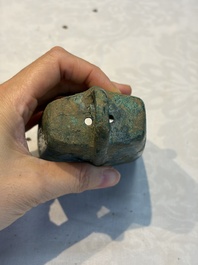 Seven various Chinese bronze and cast-iron bells, Han and later