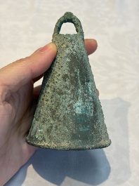 Seven various Chinese bronze and cast-iron bells, Han and later