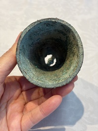 Seven various Chinese bronze and cast-iron bells, Han and later