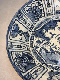 A very large Chinese blue and white 'Kraak' dish with geese by the water, Wanli