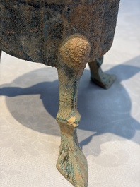 A Chinese archaic bronze food warming vessel, 'Jiao Dou 鐎斗', Han