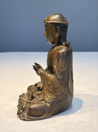 A Chinese gilt-lacquered wooden seated Bodhisattva, Ming