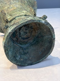 A Chinese archaic bronze ritual wine vessel with Taotie design, 'Zun 尊', Shang